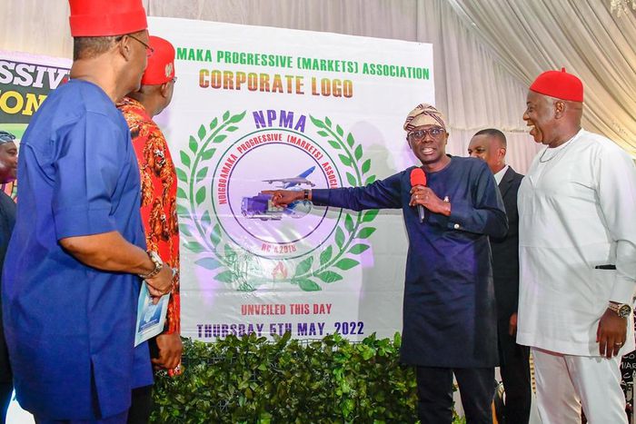 R-L: President, Ndigboamaka Progressive Market Association, Chief Dr. Jude Okeke; Lagos State Governor, Mr Babajide Sanwo-Olu and others during the unveiling of the Corporate Logo of the Ndigboamaka Progressive (Markets) Association, during the group’s...