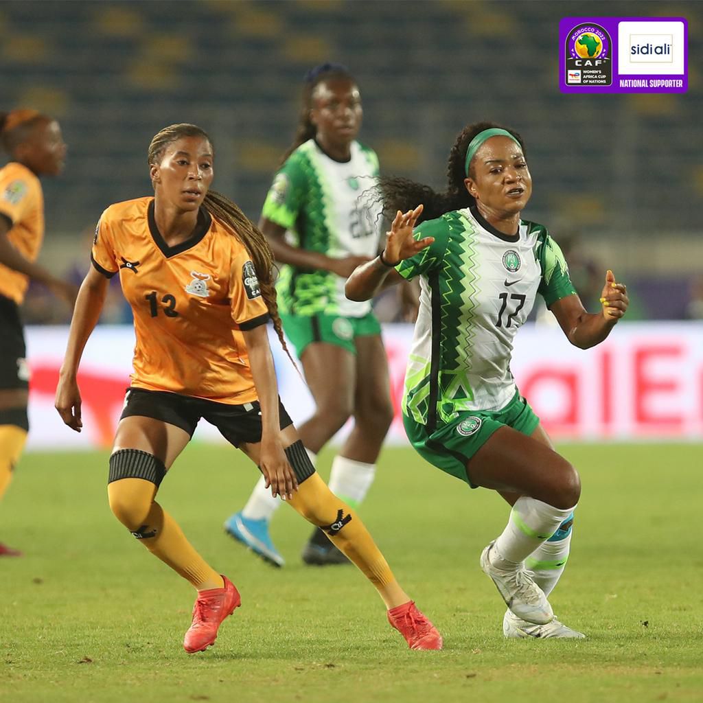 Francisca Ordega is marked by a Zambian player.