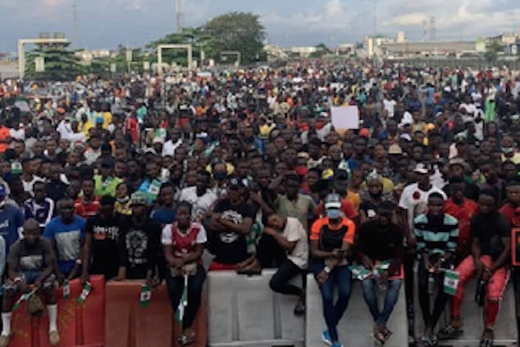 #EndSARS protesters at Lekki Tollgate protesting against police brutality and bad governance in Nigeria (ThisDay)