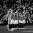 Manchester United players observe a minute silence in honour of late Queen Elizabeth II