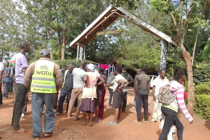 Police and residents of Kenya’s Kirinyaga County at a robbery scene