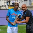Victor Osimhen poses with his award for the Serie A U23 player of the season alongside Luciano Spalletti