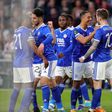 Ademola Lookman celebrates the winning goal with his teammates.