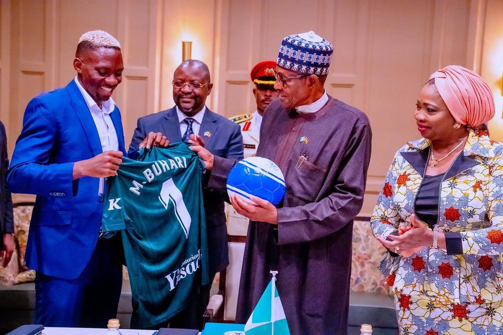 President Buhari meets Omeruo In Spain