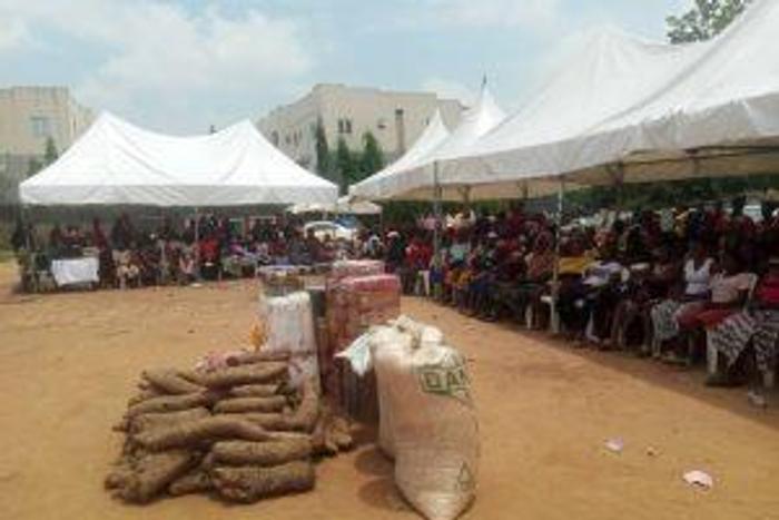 Internally Displaced Persons at Kuchingoro IDP Camp seated, waiting for the distribution of relief items by DOJ group
