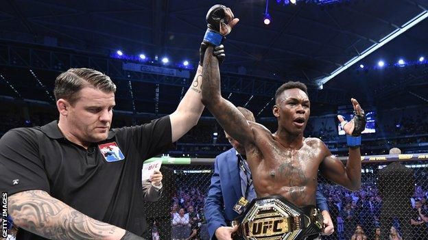 Israel Adesanya won the UFC middleweight belt by beating Robert Whittaker iin 2019