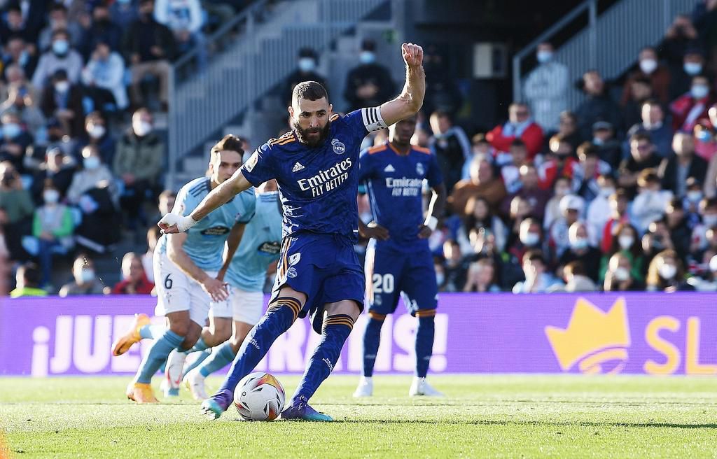 Karim Benzema scores the opener for Madrid against Celta Vigo