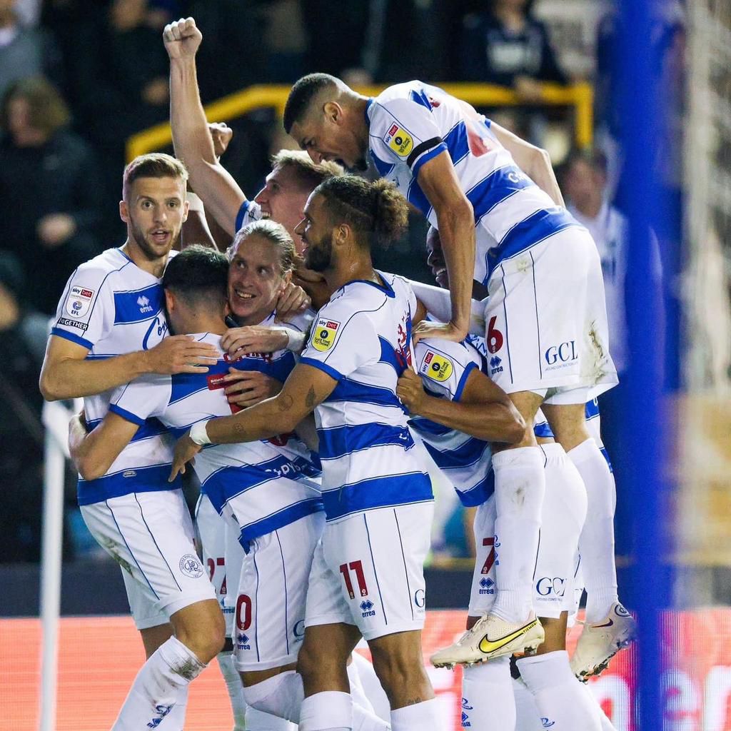 Balogun celebrates with his QPR teammates.