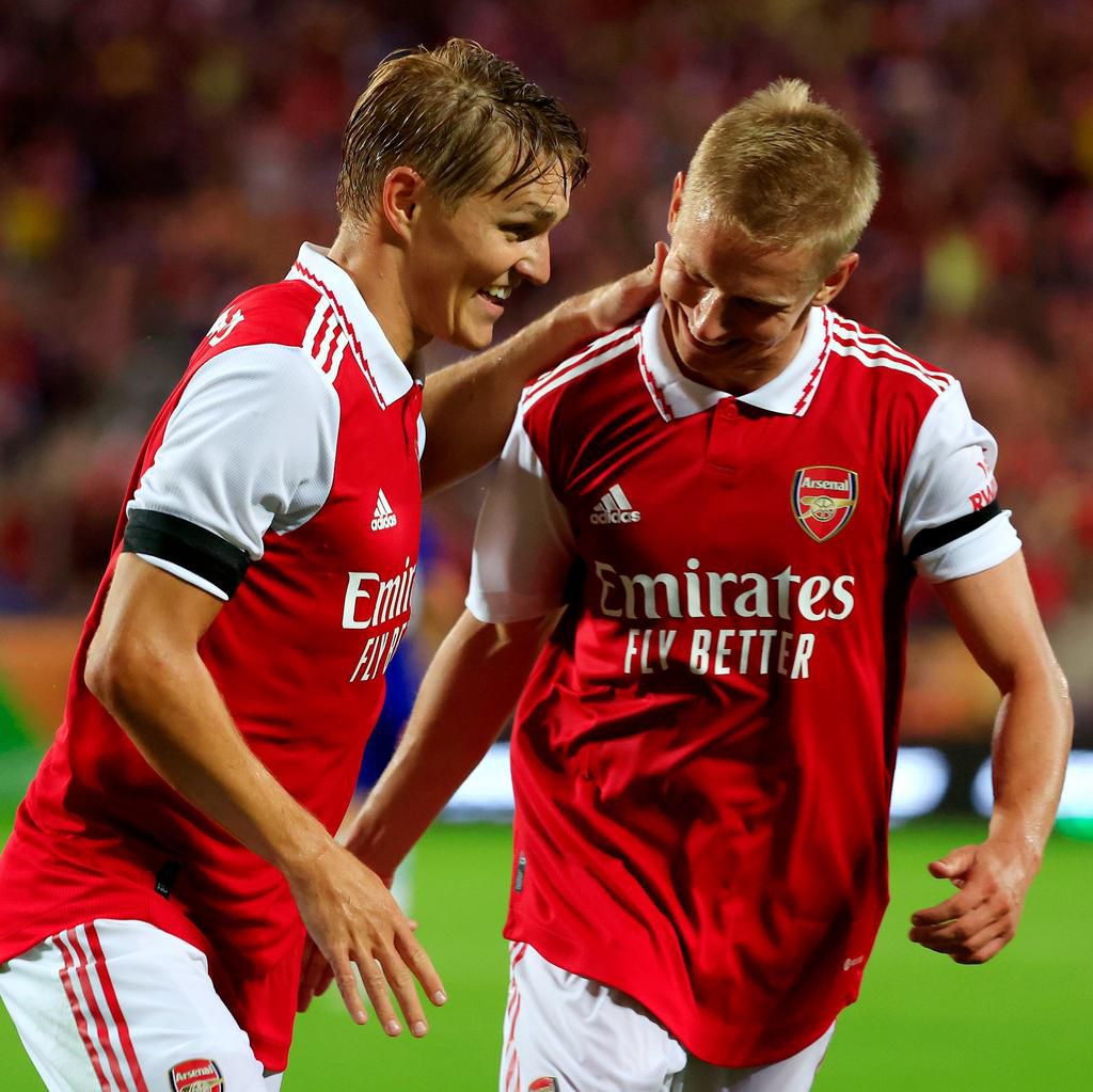 Martin Odegaard celebrates his goal with new signing, Oleksandr Zinchenko.