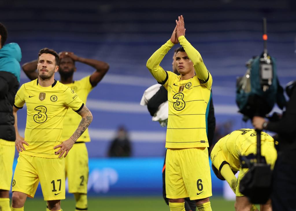 Thiago Silva applauds the travelling away fans at the Santiago Bernabeu