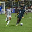 Ola Aina of Nigeria and Jordan Ayew of Ghana during the 2022 World Cup Qualifier between Ghana and Nigeria