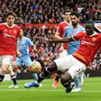 Manchester United centre-back Eric Bailly (R) concedes an own-goal against Manchester City at Old Trafford.