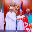 Buhari give Boyega the APC flag