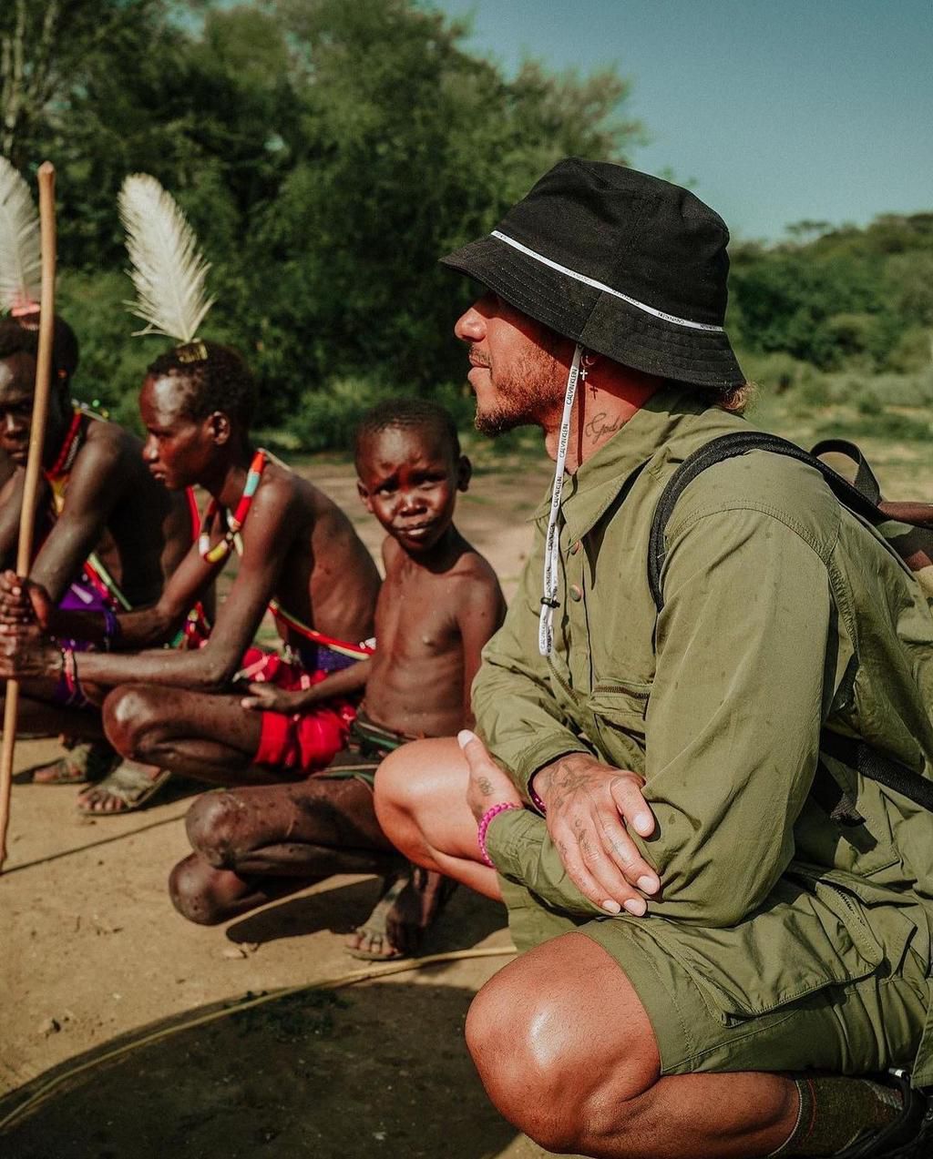 Lewis Hamilton takes part in a traditional Pokot ceremony during his recent trip to Kenya