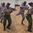 Female prison warden dances with inmate