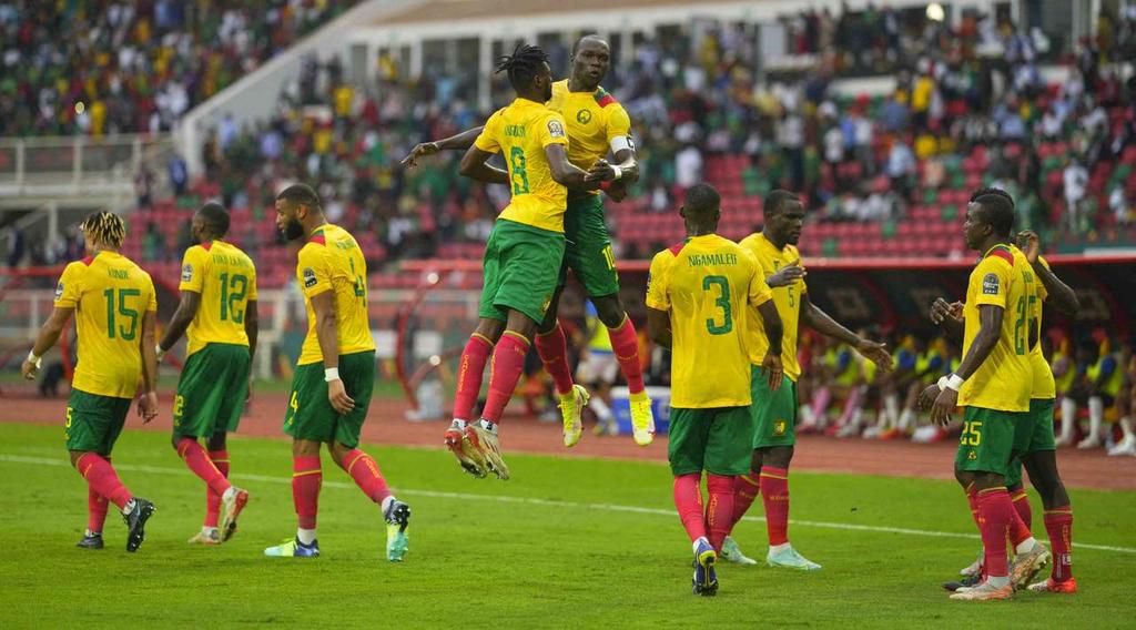Vincent Aboubakar celebrates with Cameroonian teammates