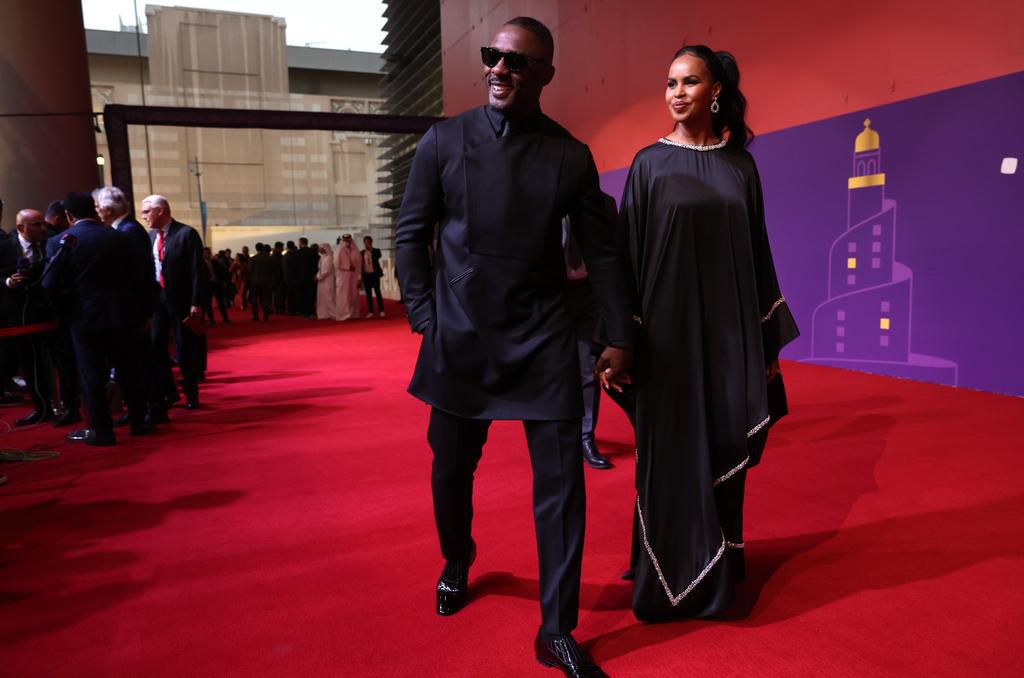 World Cup draw host Idris Elba arrives in style with his wife, Sabrina (FIFA)