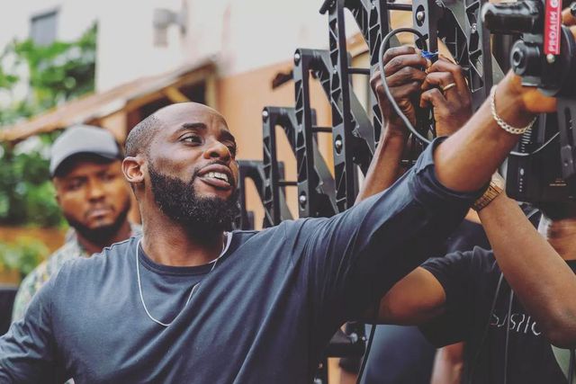 Tosin Igho on the set of 'Suspicion' movie [Instagram/suspicion_movie]