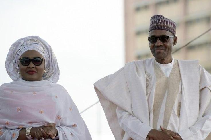 Nigerian President Mohammadu Buhari arrives with his wife Aisha, before taking oath of office in Abuja, on May 29, 2015