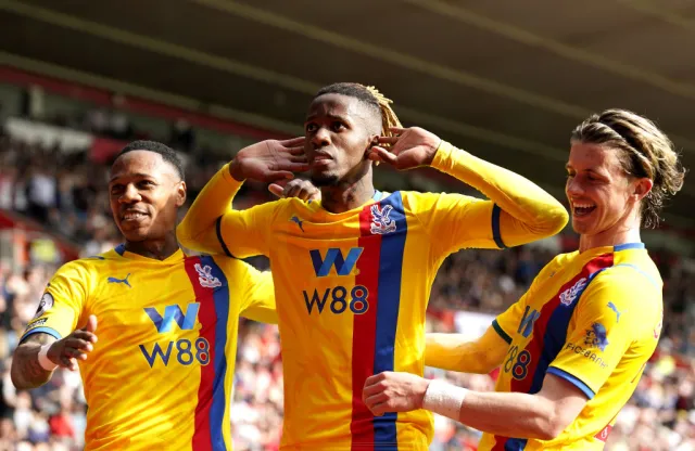 Wilfred Zaha celebrates his goal