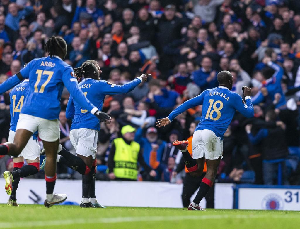 Aribo celebrates in the first half before he was subbed off due to an injury