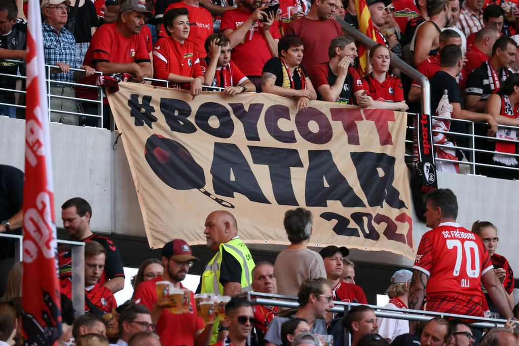 Fans in the Bundesliga protest Qatar hosting the 2022 FIFA World Cup