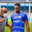 Rivers United's star Rafiu Kayode Isaq taking instructions from his coach.