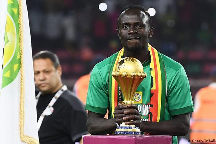 Sadio Mane with the AFCON trophy