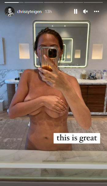 Chrissy Teigen poses totally nude in steamy mirror selfie