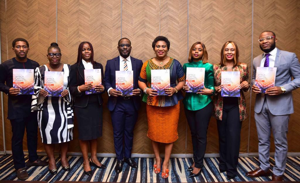 Emerging Africa Group employees pose for a photo at the Launch of the Africa Markets report