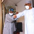 Former Lagos governor, Bola Tinubu (left), with President Muhammadu Buhari [Presidency]
