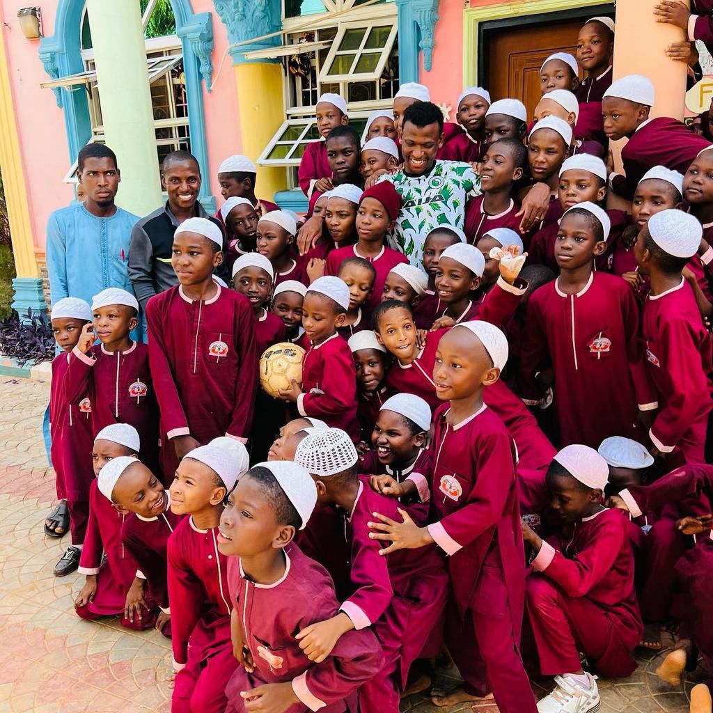 Shehu Abdullahi has fun with kids in Sokoto