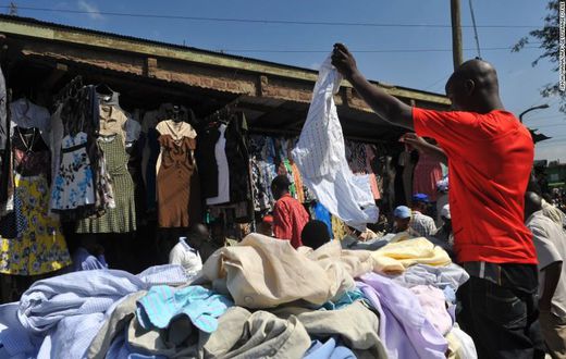 A man selling used or thrift clothes {wealthresult}
