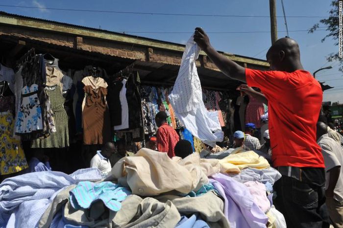 A man selling used or thrift clothes {wealthresult}