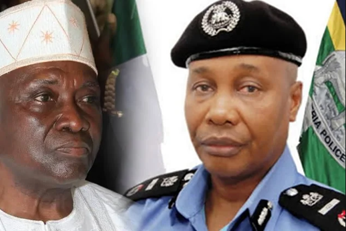 Musiliu Smith and IGP Usman Baba. [The Punch]
