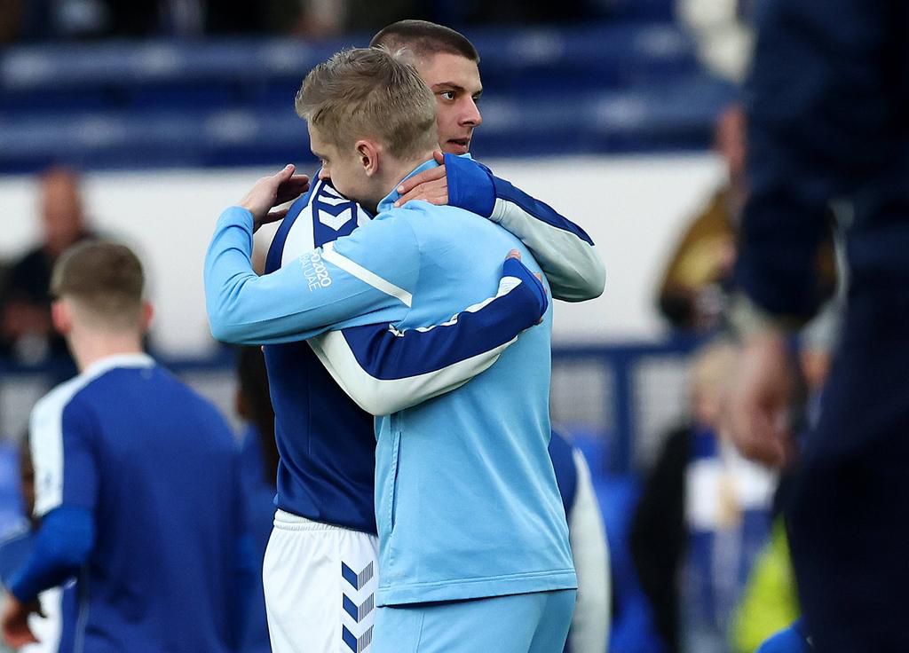 Zinchenko and Mykolenko share a passionate embrace amidst the war between Russia and Ukraine