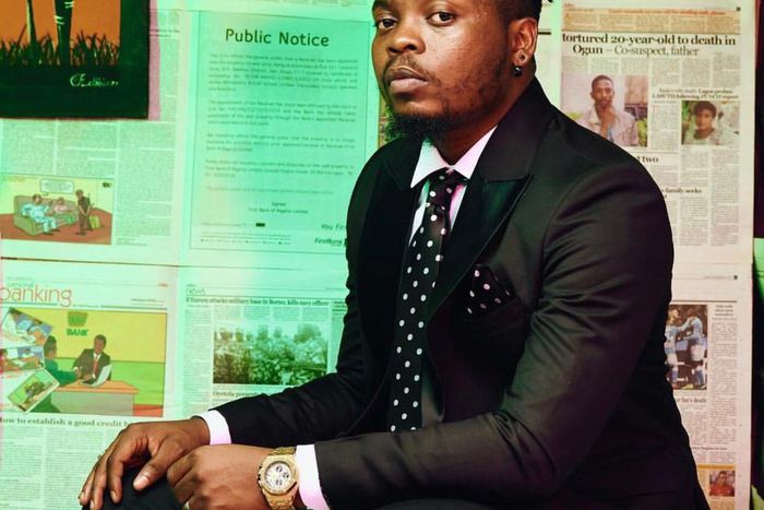 Olamide might have struck gold after his recent chat with billionaire banker, Tony Elumelu. [Twitter/OlamideAdedeji]