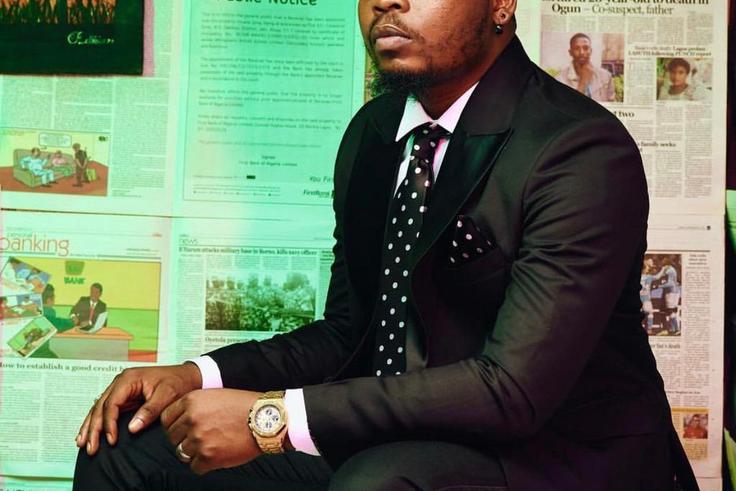 Olamide might have struck gold after his recent chat with billionaire banker, Tony Elumelu. [Twitter/OlamideAdedeji]