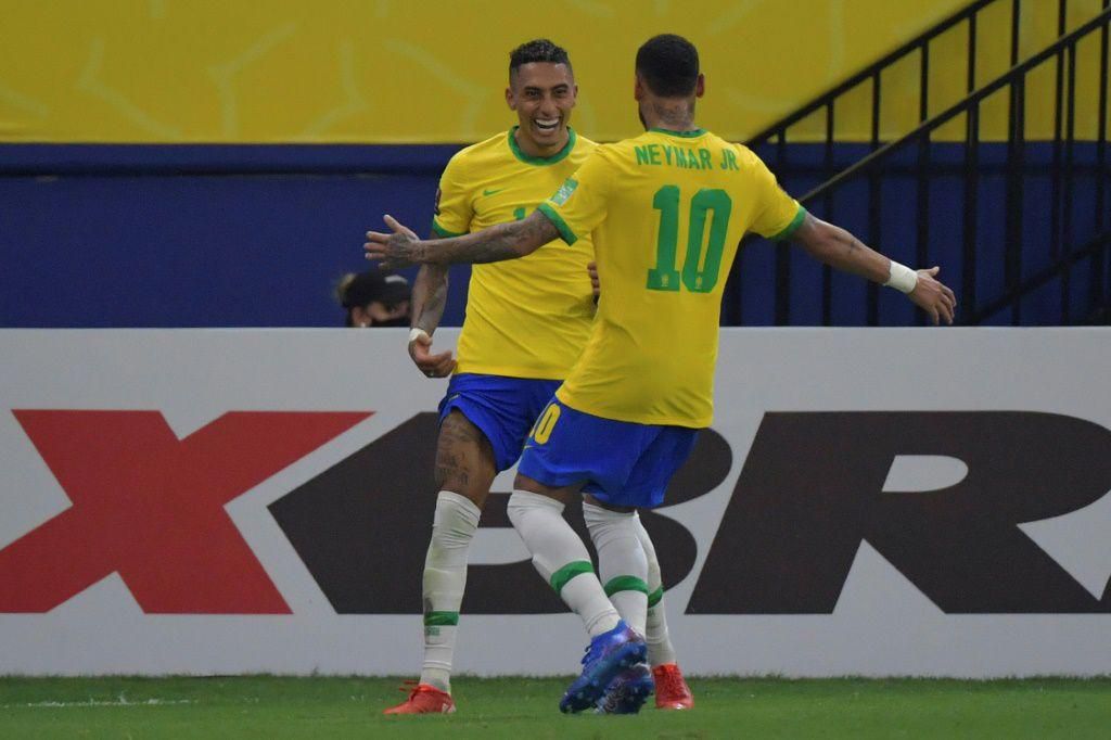 Raphinha (left) celebrates with Neymar after scoring his first goal for Brazil in a 4-1 World Cup qualifier thrashing of Uruguay