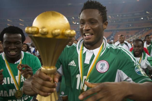 John Mikel Obi with Nigeria's 2013 AFCON title