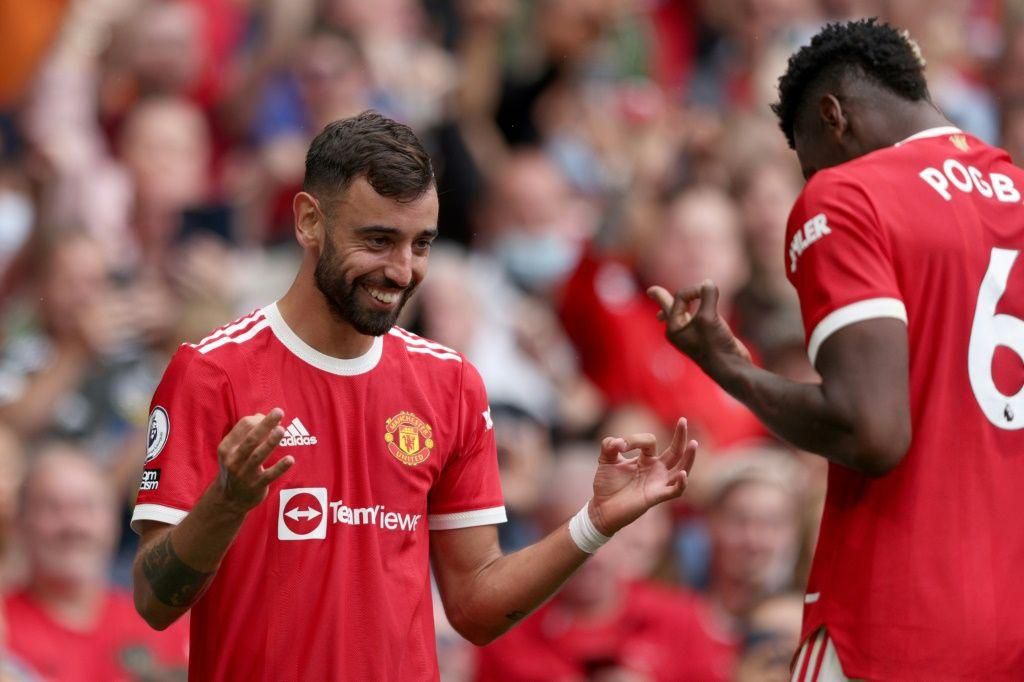 Deadly duo: Bruno Fernandes (left)scored a hat-trick and Paul Pogba (right)provided four assists in Manchester United's 5-1 win over Leeds
