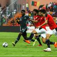 Leicester City's Iheanacho taking on three Egyptian defenders