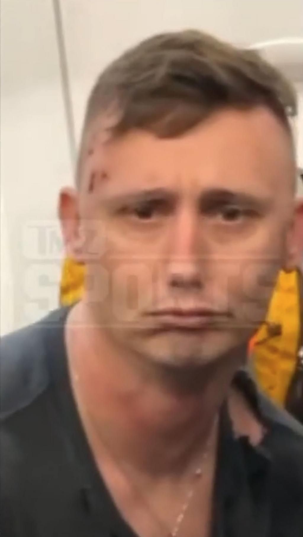 The man on the receiving end of the punches was left bloodied