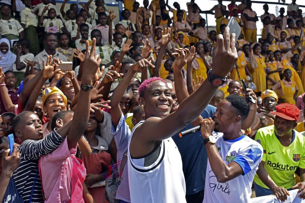 Oshoala with young girls at the 2019 edition of Football4Girls in Lagos, Nigeria