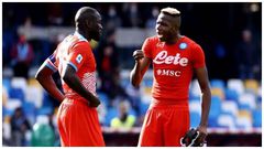 A disappointed Osimhen speaks to teammate and Senegal's Kalidou Koulibaly after the game.