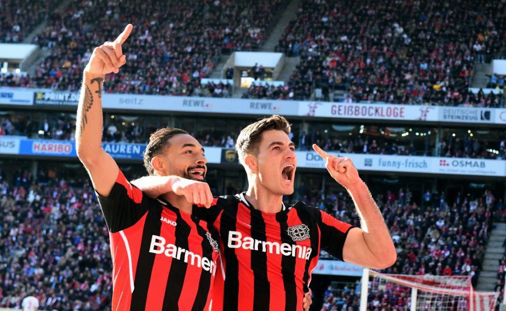 Leverkusen's Czech forward Patrik Schick (R) scored four goals on Saturday