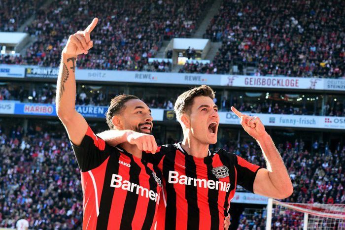 Leverkusen's Czech forward Patrik Schick (R) scored four goals on Saturday