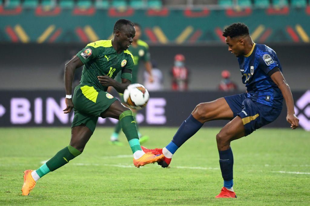 Senegal forward Sadio Mane (L) is challenged by Cape Verde defender Steven Fortes during an Africa Cup of Nations last-16 match in Bafoussam on Tuesday