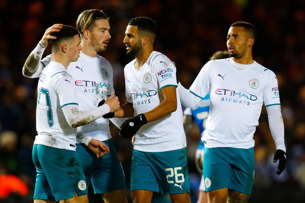 City players celebrate with Riyad Mahrez after he broke the deadlock