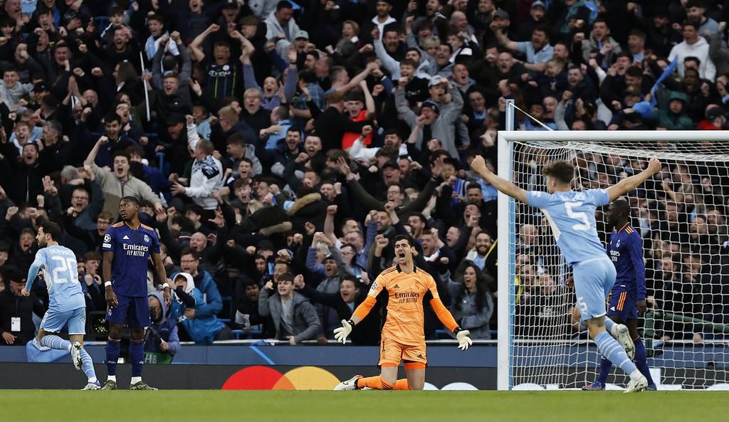 Thibaut Courtois looking on helplessly as his side concedes their second goal